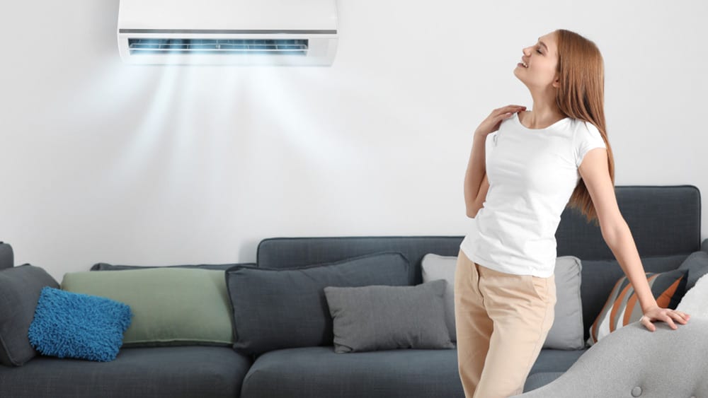 Girl enjoying improved HVAC airflow