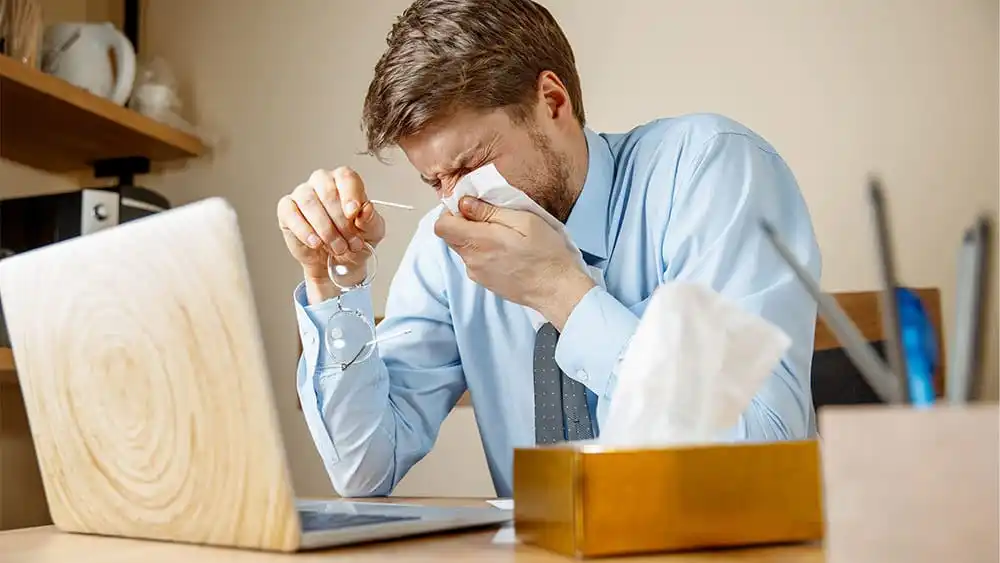 Man sick due to poor indoor air quality.