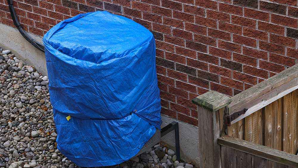 Air conditioner covered for the winter season