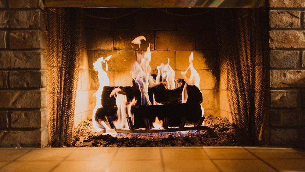 Open fire in indoor fireplace poses heating safety risk