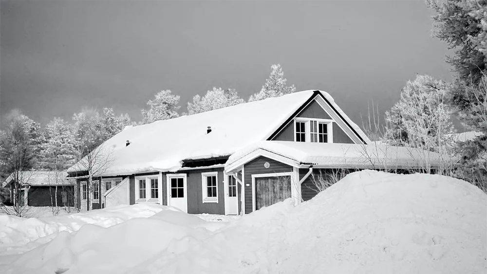house covered in snow 