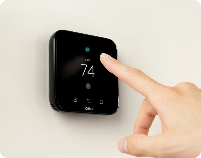 A person pointing at breez edge device