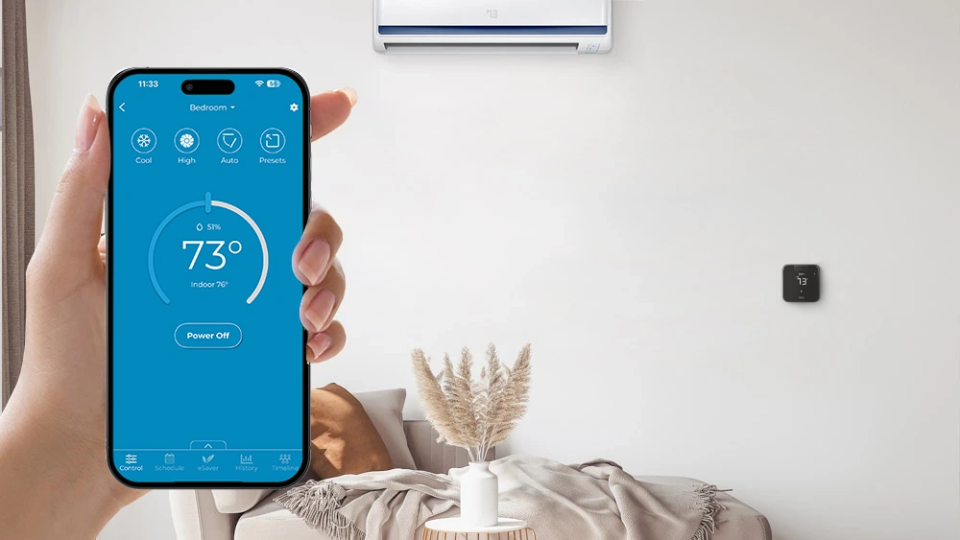 A person using cielo home app to make temperature adjustments