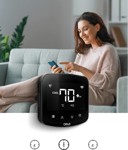 Woman relaxing after work as Cielo breez manages perfect home temperature
