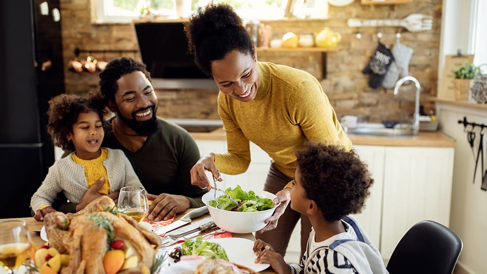 Family enjoying thanksgiving dinner.