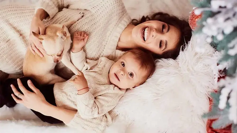 mother and baby laughing