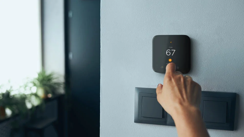 person using cielo smart thermostat