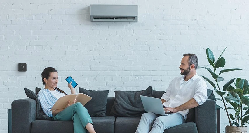 A woman using Cielo home app