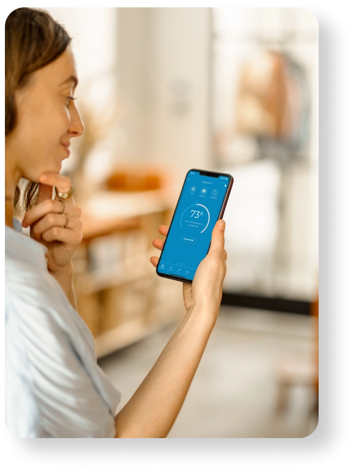 A woman using Cielo Home App