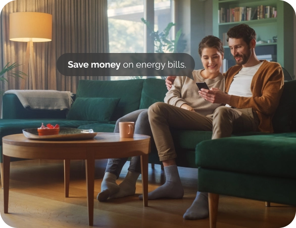 Couple using cielo smart thermostat from phone to save energy