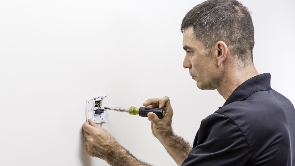 installing thermostat on the wall