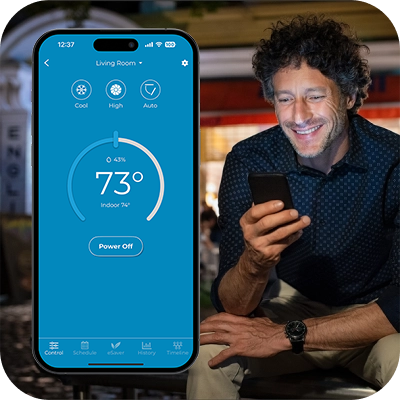 A man managing home his home climate when away using the Cielo Home app