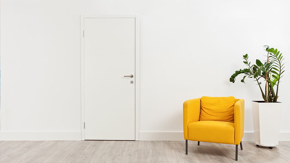 Bright colored sofa in a small room